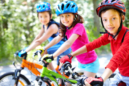 students biking to school