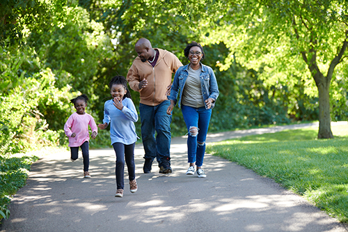 Family walking on a walking path