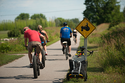 Cyclists riding the Traverse Area Recreation Trail